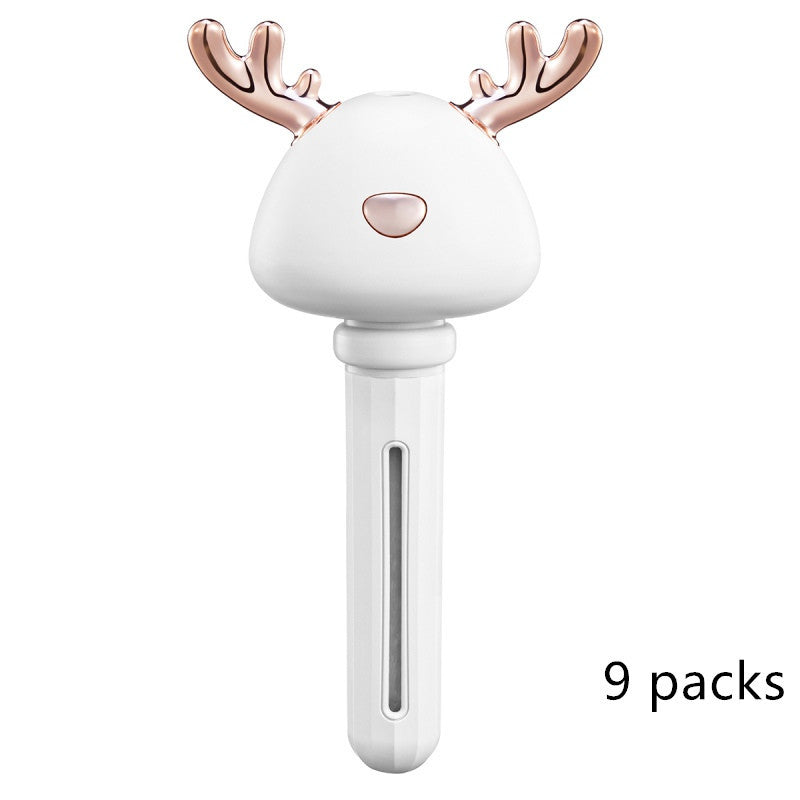 a white and gold reindeer head