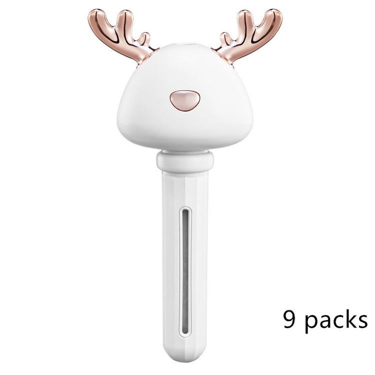 a white and gold reindeer head