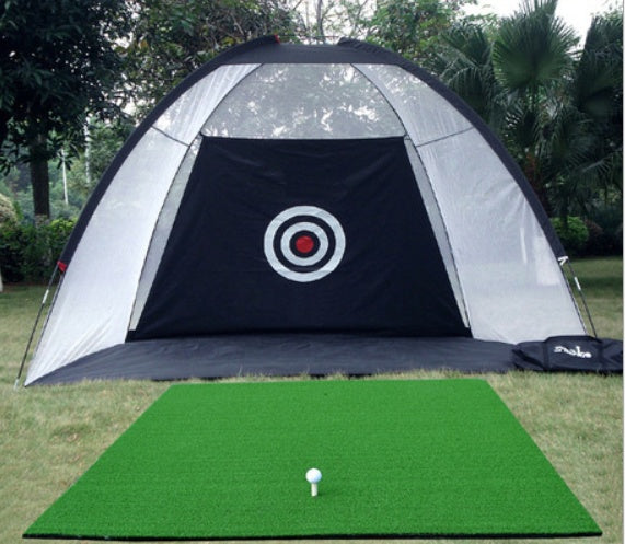 a golf course with a black and white target on the wall