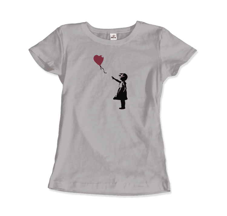 a white shirt with a picture of a girl holding a balloon