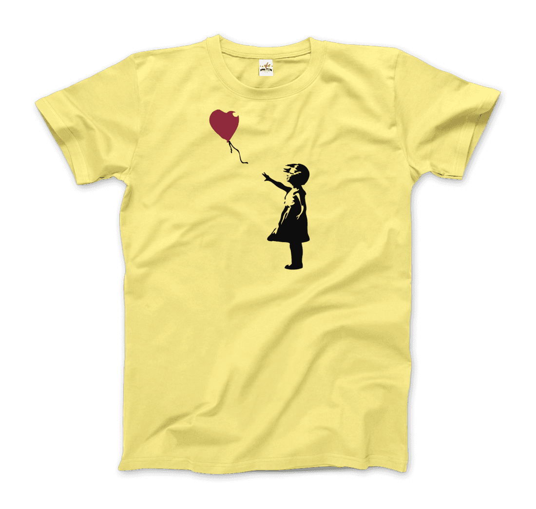 a yellow t-shirt with a drawing of a boy holding a balloon