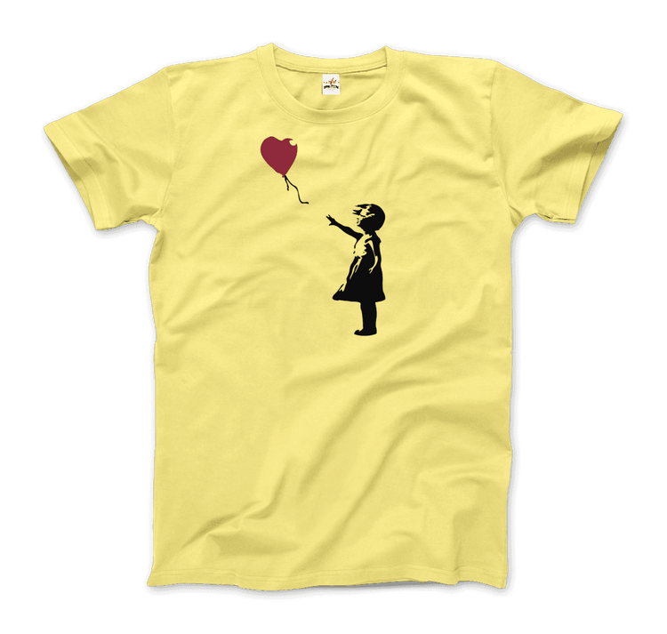 a yellow t-shirt with a drawing of a boy holding a balloon