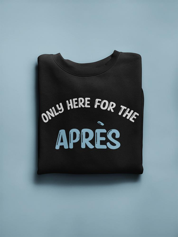 a black sweatshirt folded on a blue background