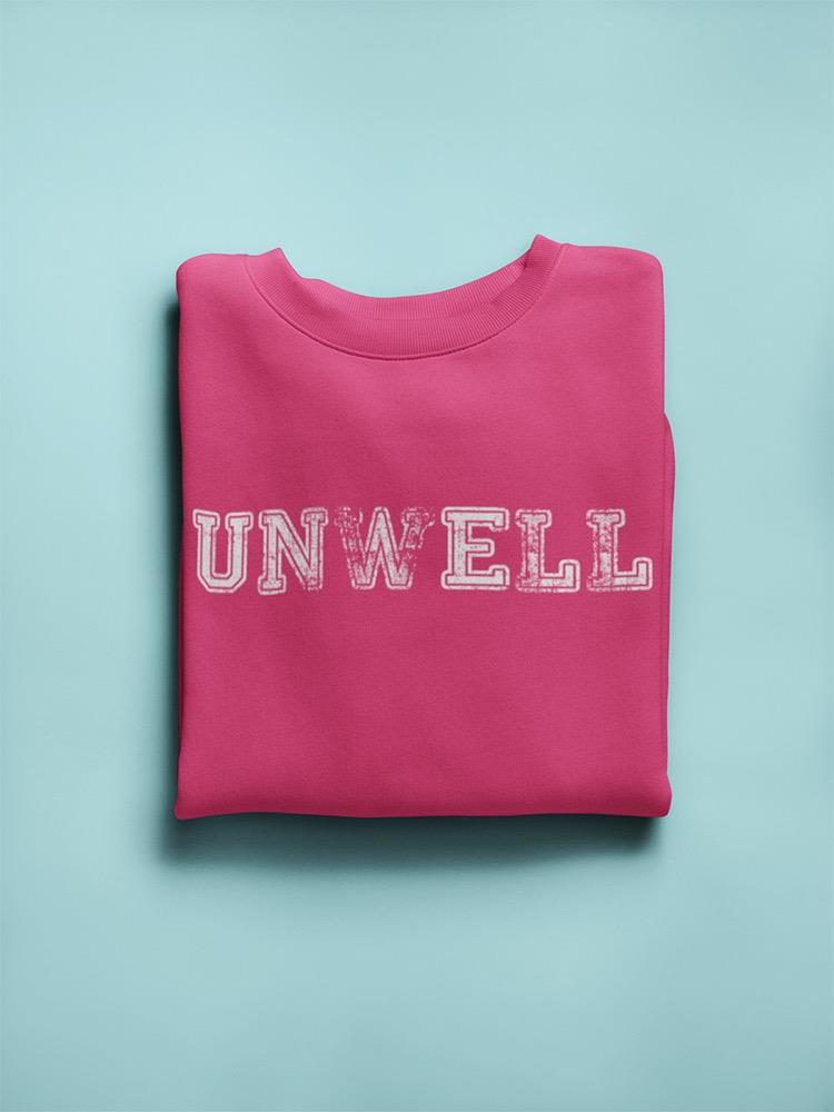 a folded pink sweatshirt on a blue background