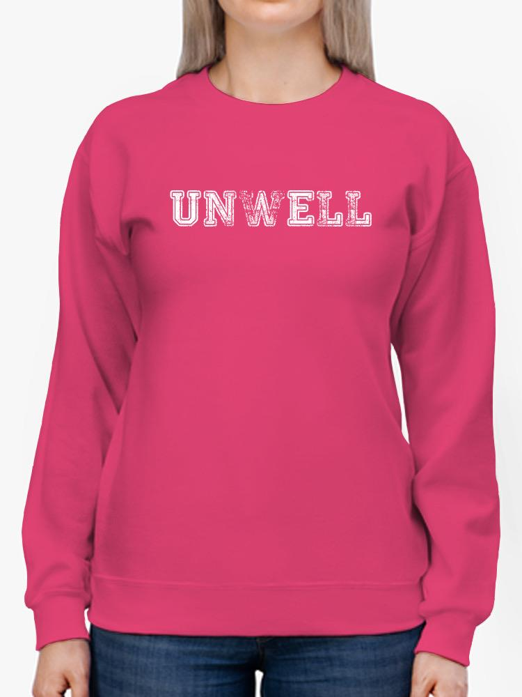 a person wearing a pink sweatshirt