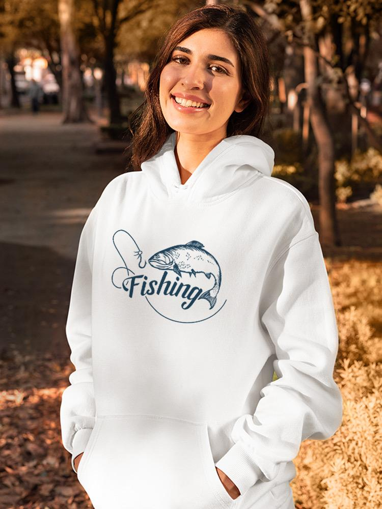 a woman in a white sweatshirt
