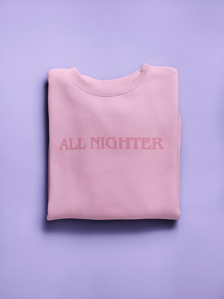 a folded pink sweatshirt on a purple background