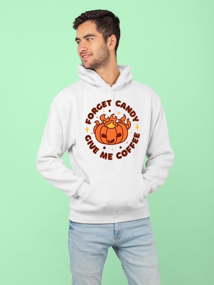 a man wearing a white sweatshirt with a pumpkin on it