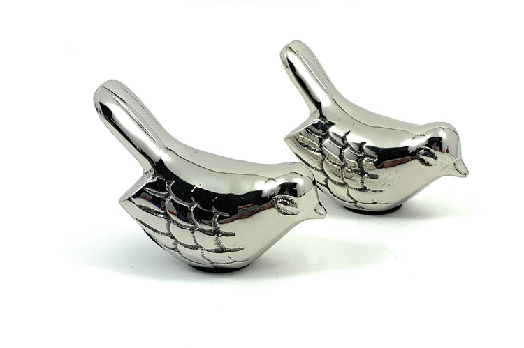 a pair of silver birds