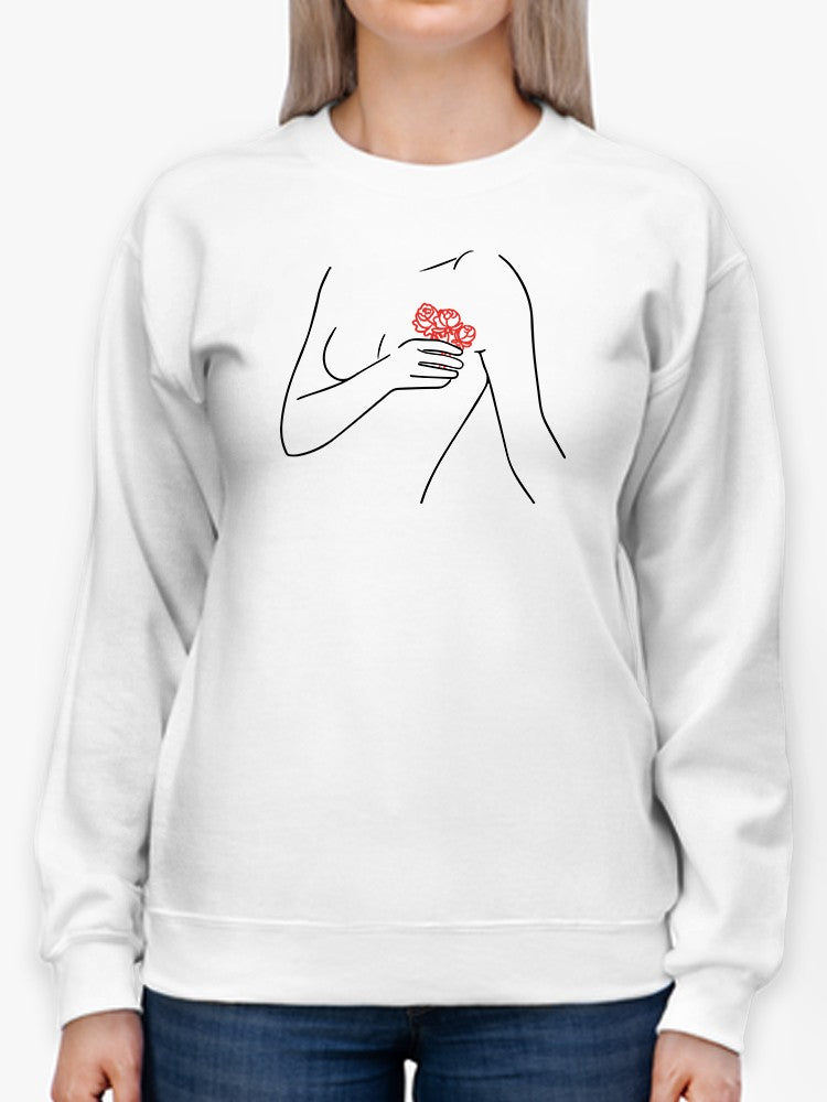 a woman wearing a white sweatshirt