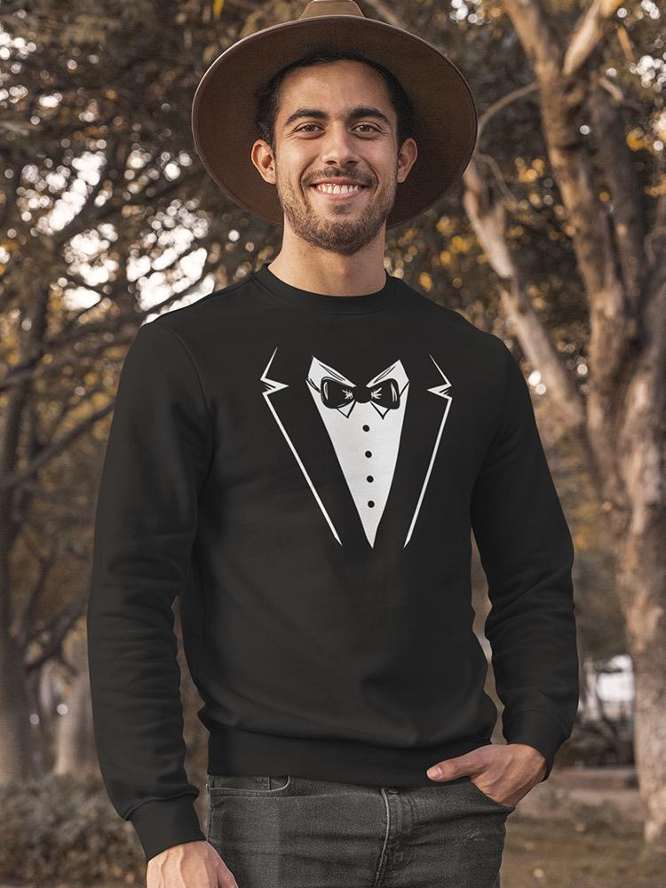 a man wearing a hat and a black shirt