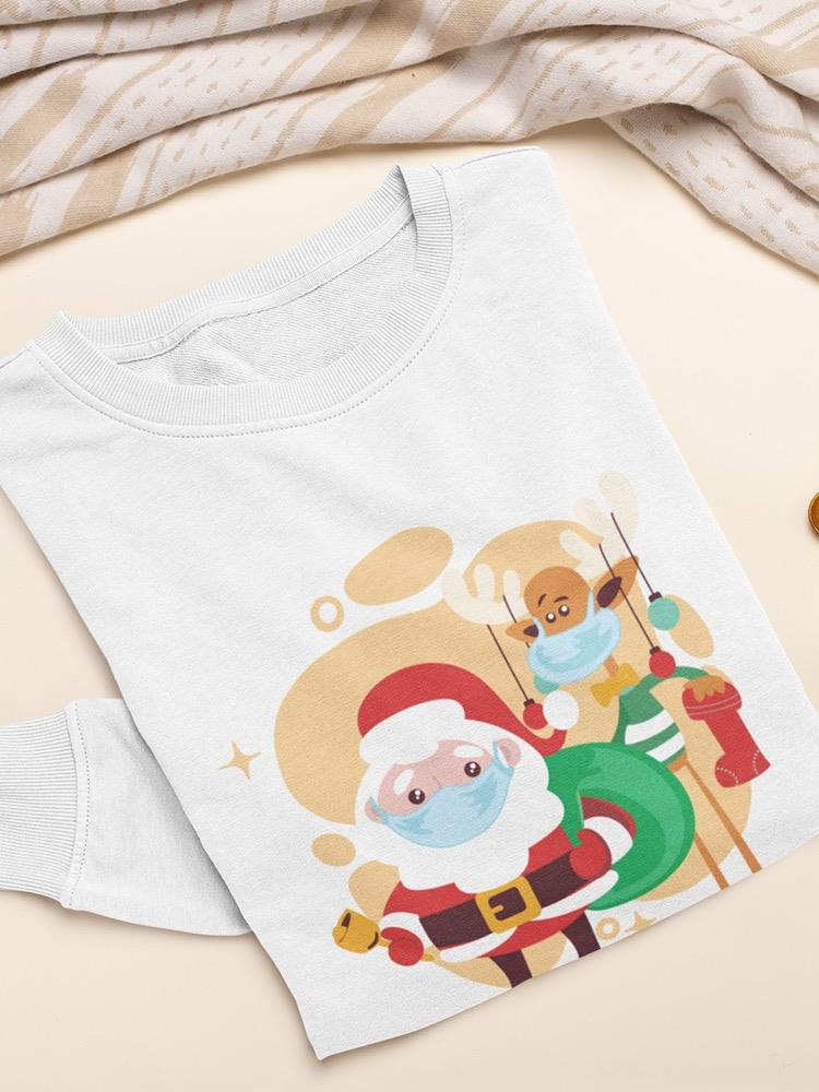 a white shirt with a cartoon of santa claus and reindeer
