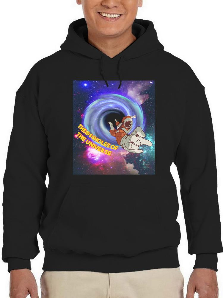 a person wearing a black hoodie with a cartoon astronaut in space
