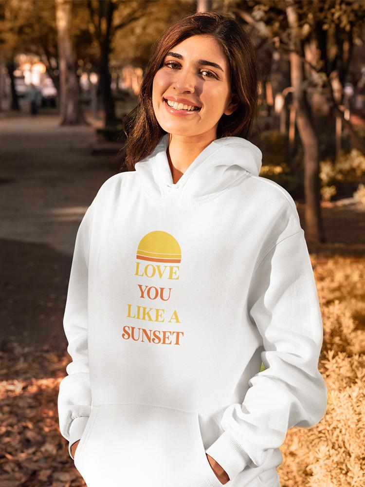a woman in a white sweatshirt