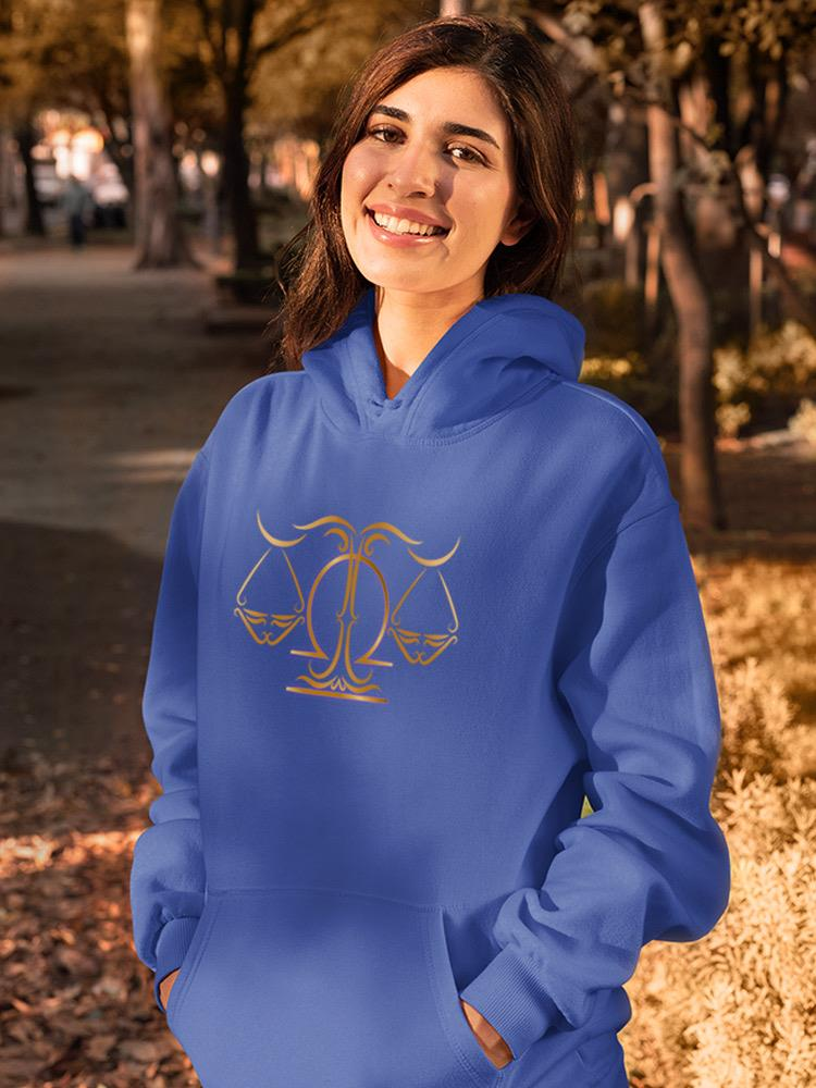 a woman in a blue hoodie
