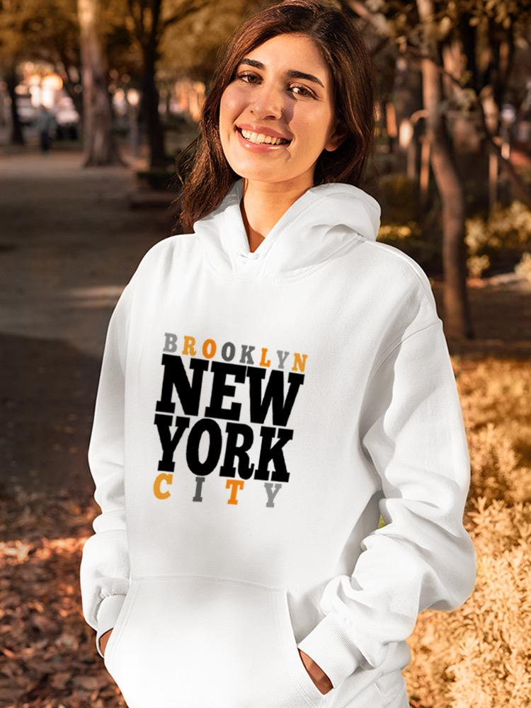 a woman in a white sweatshirt
