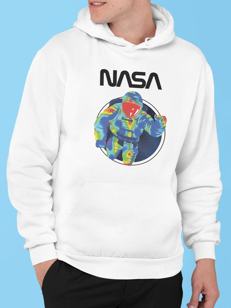 a person wearing a white sweatshirt with a space suit on it