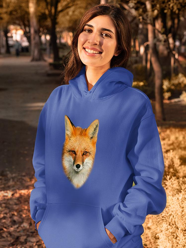 a woman smiling with a fox on her sweatshirt