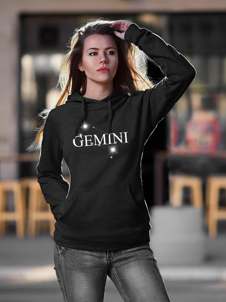 a woman in a black hoodie