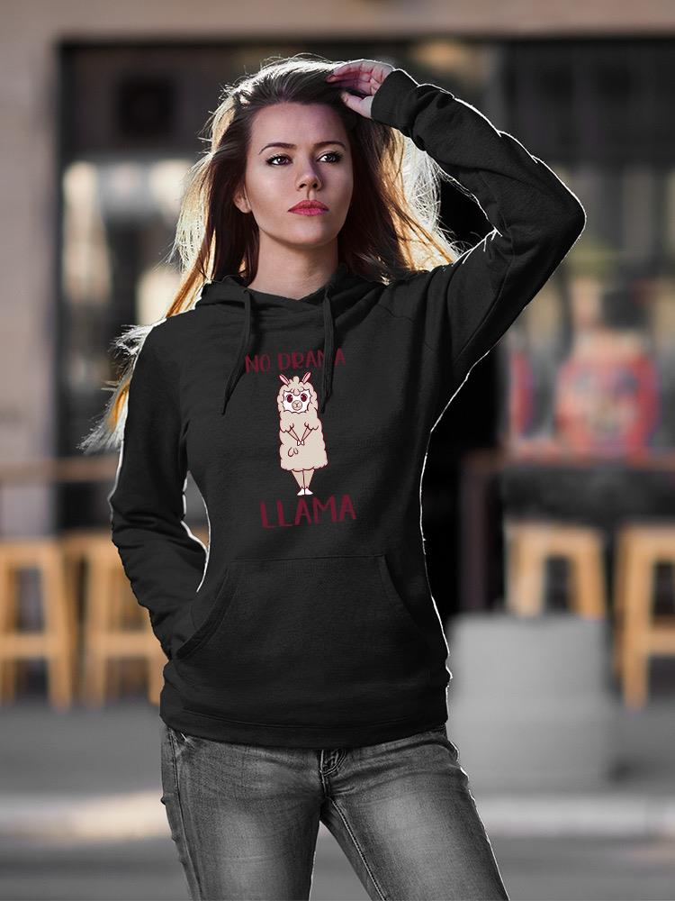 a woman in a black hoodie