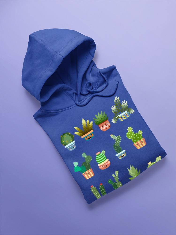 a blue hoodie with a cartoon cactuses on it