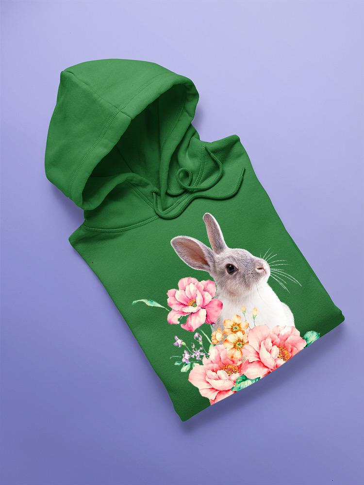 a green sweatshirt with a rabbit on it