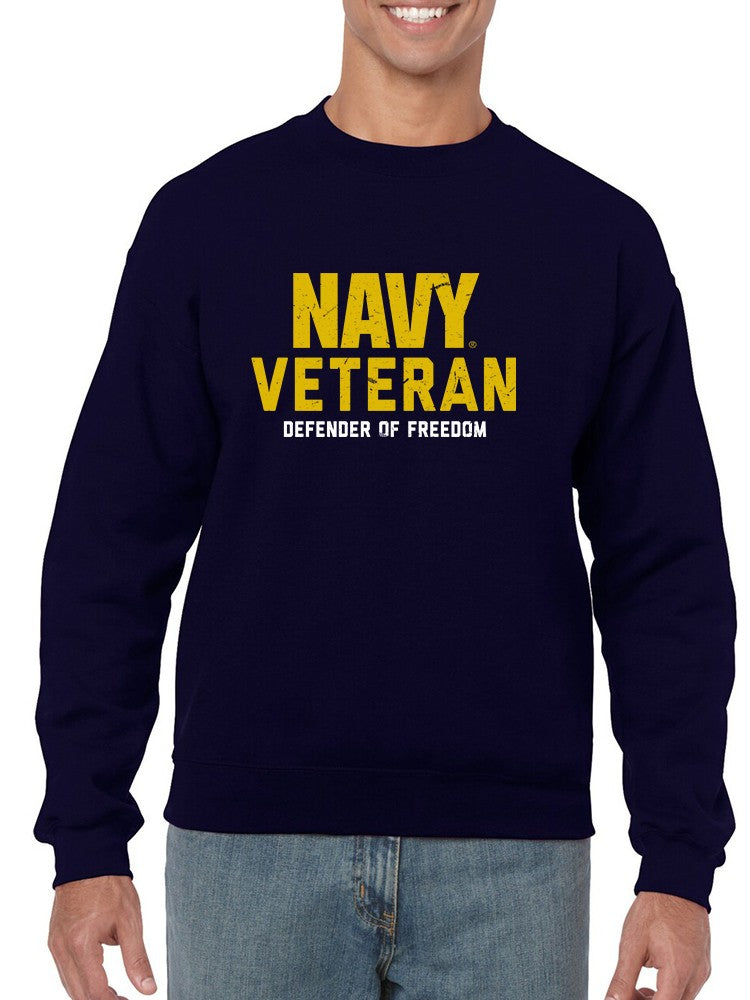 a person wearing a navy sweatshirt