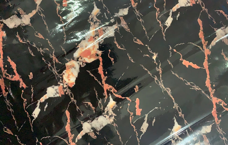 a black and white marble surface