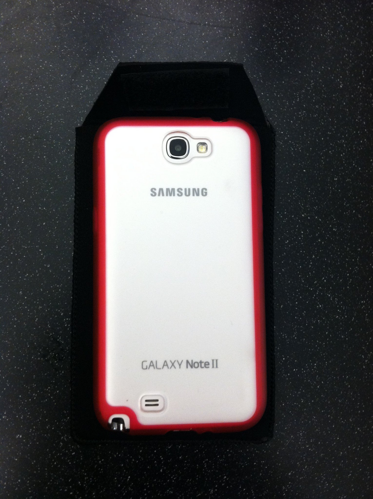 a cell phone case on a black surface