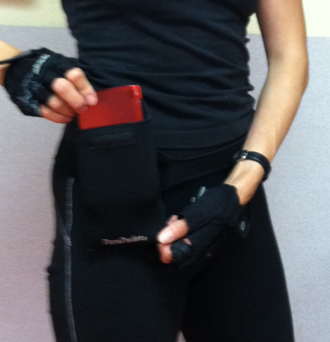 a person wearing black gloves and a black shirt