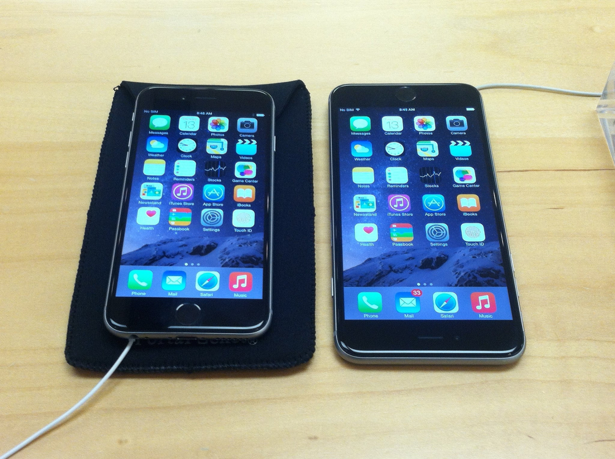 two cell phones on a table