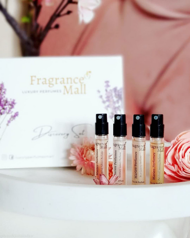 a group of small bottles of perfume