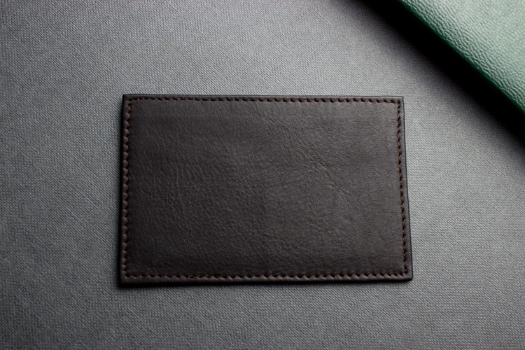 a black leather card holder