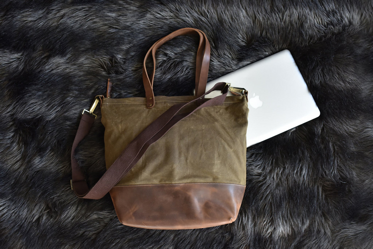 a bag next to a laptop
