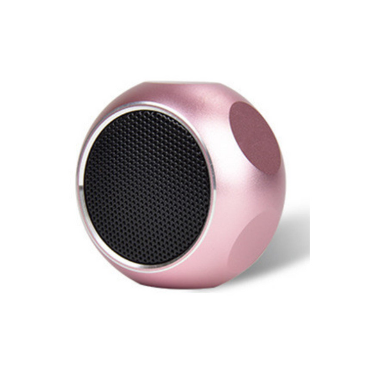 a pink and black round speaker