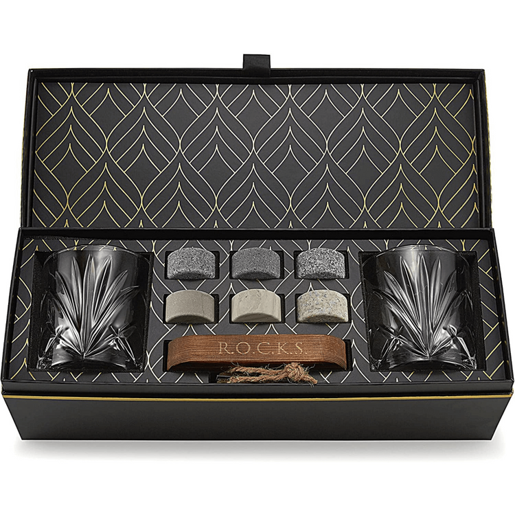 a box with a black box with a black and gold box with a black and gold patterned box with a black and grey box with a black and grey box with a gold pattern on it