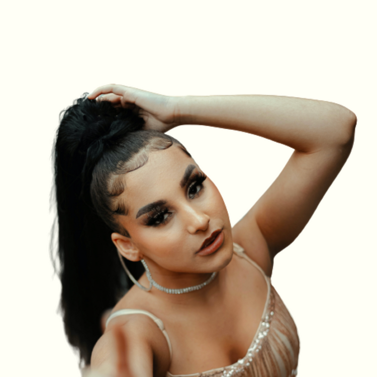 a woman with her hair up and her hand up