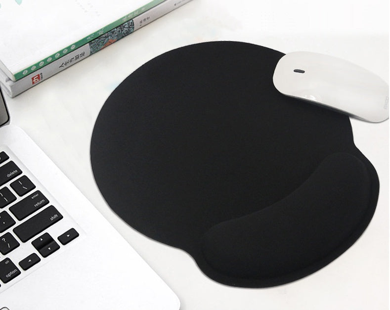 a mouse and mouse pad on a white surface
