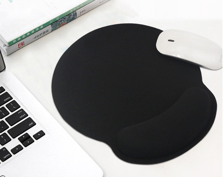 a mouse and mouse pad on a white surface