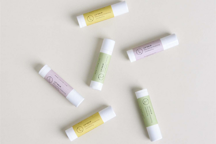 a group of small white and yellow containers