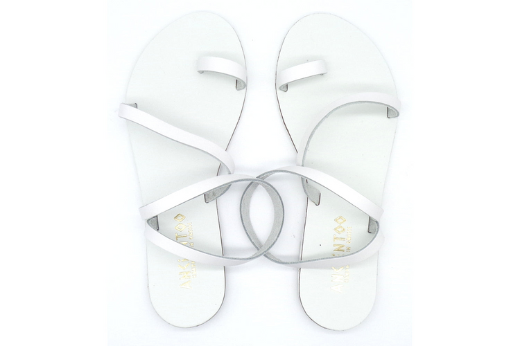 a pair of white sandals