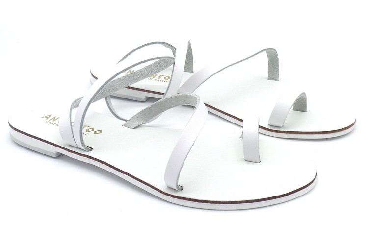 a pair of white sandals