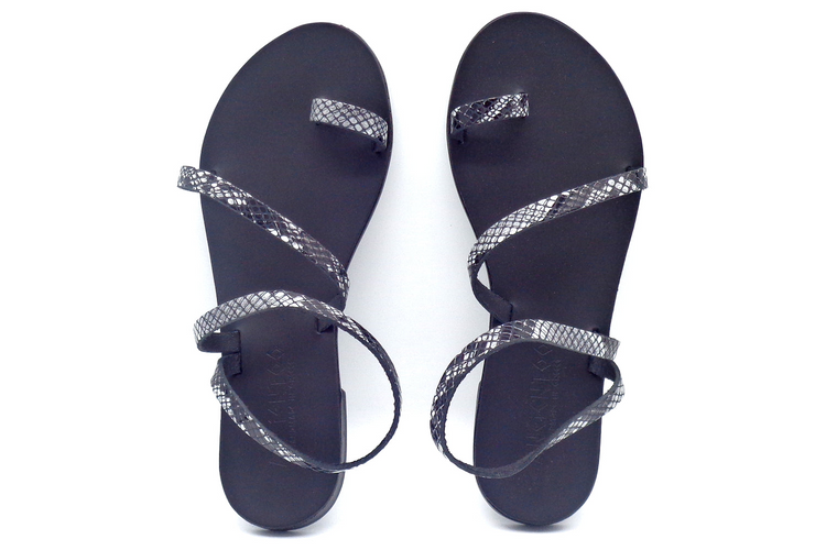 a pair of sandals with a snake pattern
