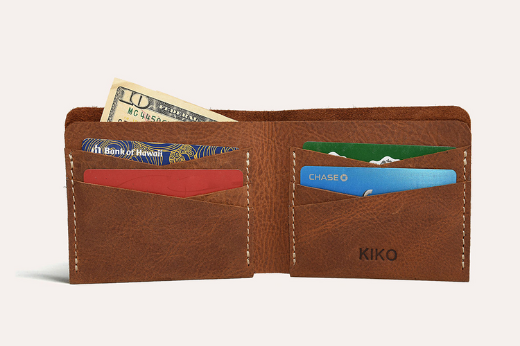 a wallet with money and cards inside