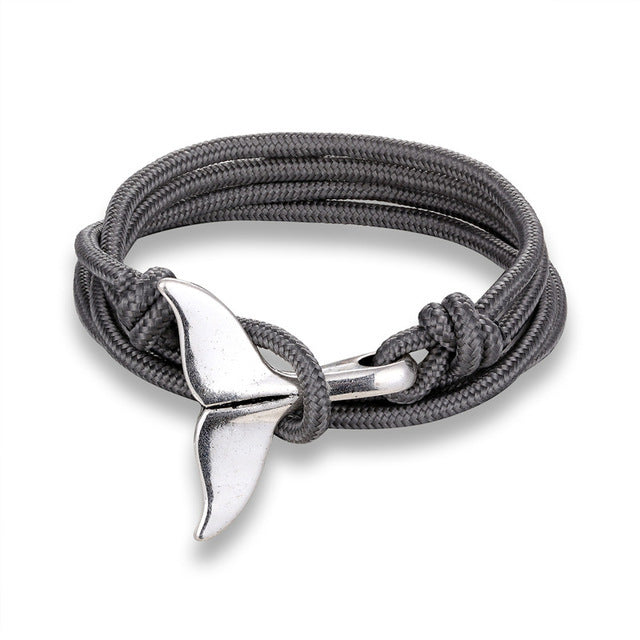 a silver whale tail bracelet