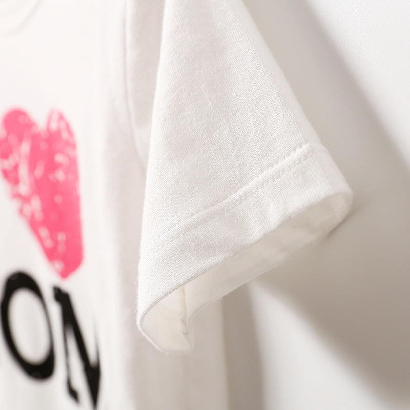 a white shirt with a heart on it