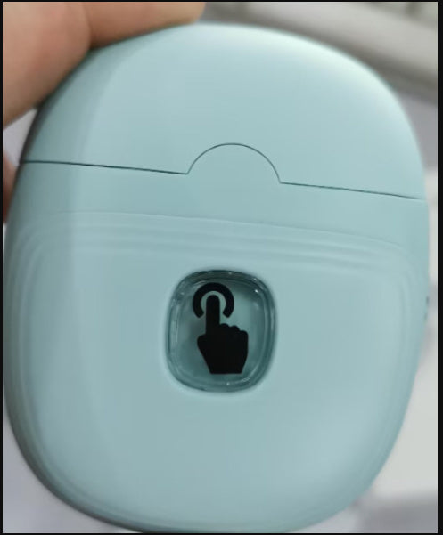 a hand holding a device