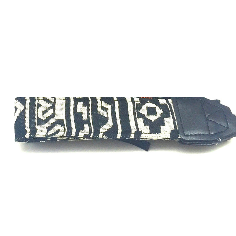 a black and white strap with a black and white design