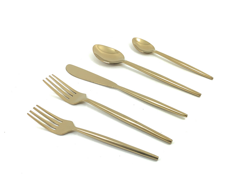 a group of silverware on a white background