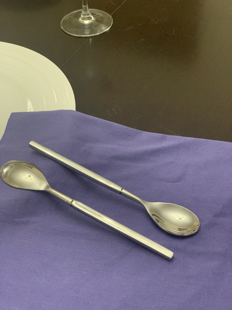 a spoons on a purple towel